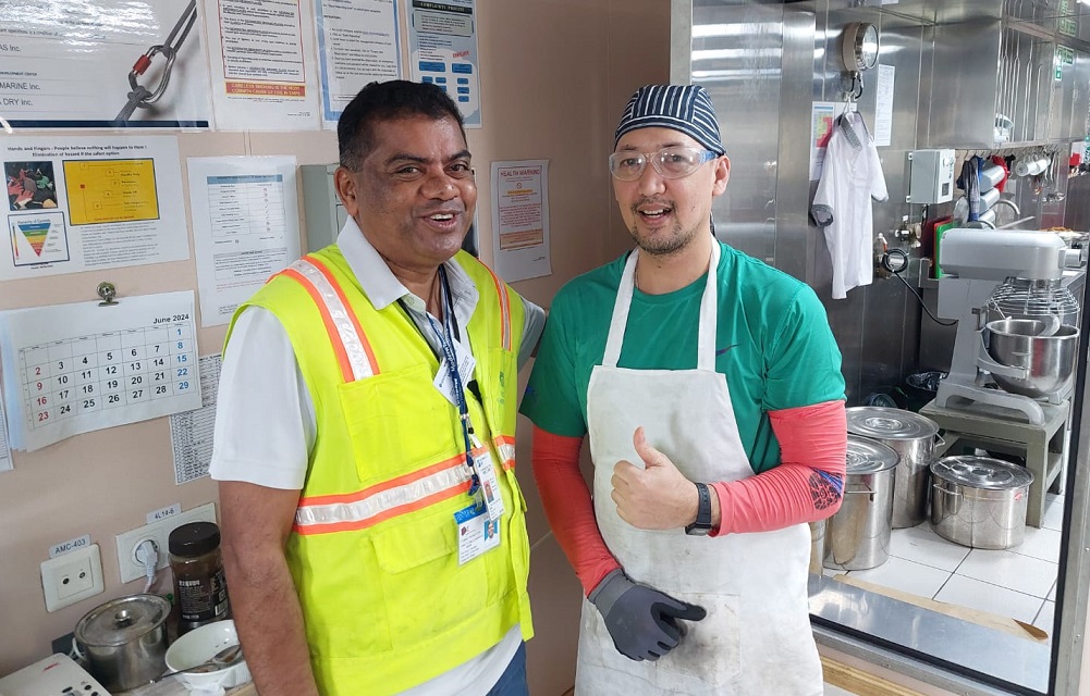 Father Valan comforting another Filipino Seafarer, Container Terminals, HK