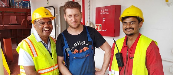 Father Valan with two seafarers, Container Terminals, HK