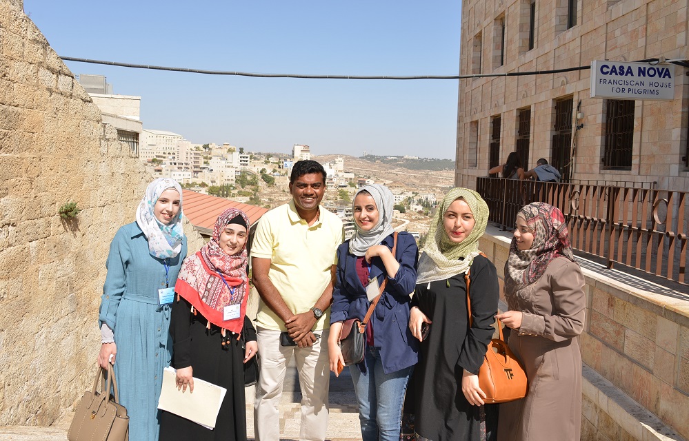 Schoolgirls with Father Valan, Bethlehem, Palestine, 2016